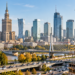 Warsaw skyline with active construction representing investment and economic growth in Poland