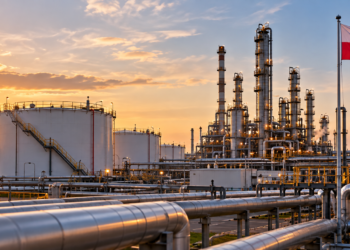 Large Polish fuel refinery and storage facility at sunset