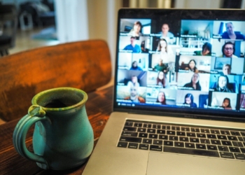 macbook pro displaying group of people