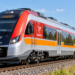 AI-generated editorial illustration of a red-and-white POLREGIO-style regional diesel train on railway tracks; not a photograph of one of the purchased trains