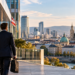 Business traveller overlooking Vienna during Symfonia's expansion into Austria