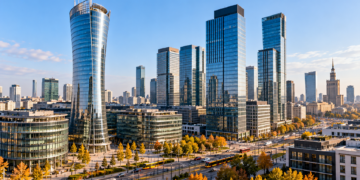 AI-generated cityscape representing Warsaw's business district with modern office towers and trams; conceptual image, not a documentary photograph of Berkshire Hathaway Specialty Insurance's office