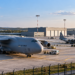 AI-generated illustration of transport aircraft on a generic airfield, not the planned Wrocław APOD facility.